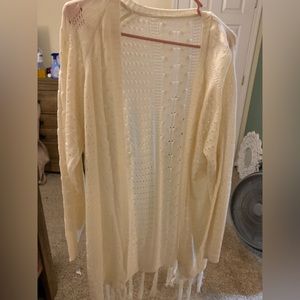Cream colored cardigan with fringe